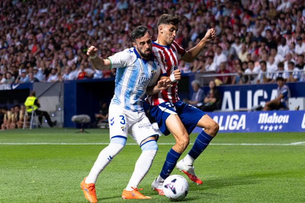 ESP: Atletico de Madrid v Malaga CF La Liga EA Sports Dani Martinez of Atletico de Madrid protects the ball against Carlos Francisco Puga of Malaga during a Liga EA Sports match between Atletico de Madrid and Malaga CF at Estadio Riyadh Air Metropolitano on August 19, 2026 in Madrid, Spain. Madrid Madrid Spain Football *** ESP Atlético de Madrid vs. Málaga CF La Liga EA Sports Dani Martínez of Atlético de Madrid shields the ball from Carlos Francisco Puga of Málaga during an EA Sports La Liga match between Atlético de Madrid and Málaga CF at Estadio Riyadh Air Metropolitano on August 19, 2026, in Madrid, Spain Madrid Madrid Spain Soccer Copyright: xAlejandroxMatiasx