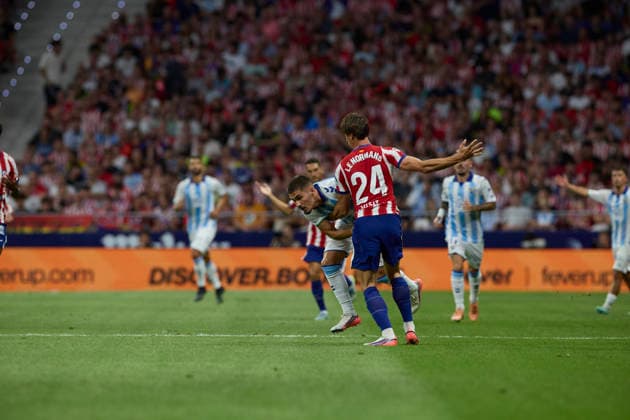 ESP: LaLiga EA Sports Atletico de Madrid v Malaga CF; Robin Le Normand of Atletico de Madrid and Carlos Ruiz Chupete during LaLiga EA Sports between Atletico de Madrid v Malaga CF played at Riyadh Air Metropolitano Stadium in Madrid on August 19, 2026 in Spain Spain Futbol *** ESP LaLiga EA Sports Atlético de Madrid vs. Málaga CF Robin Le Normand of Atlético de Madrid and Carlos Ruiz Chupete during the LaLiga EA Sports match between Atlético de Madrid and Málaga CF, played at Riyadh Air Metropolitano Stadium in Madrid on August 19, 2026, in Spain. Spanish Soccer Copyright: xAgenciaxLOFx