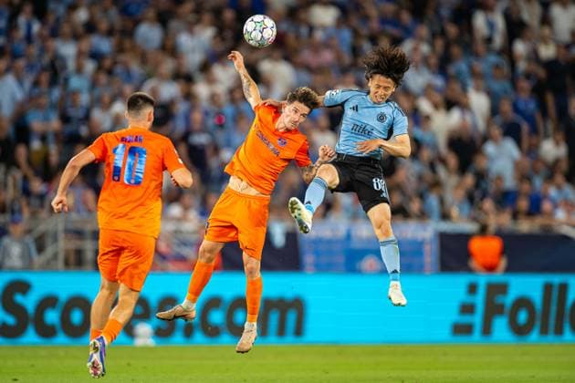 Benjamin Verbic in a battle with Daiki Matsuoka during Champions League qualifying playoff match, SK Slovan Bratislava - NK Celje , 19. august 2026, Tehelne pole Stadium, Bratislava, Slovakia Copyright: xMICHALxFAJT,ZOSPORTU.SKx MAR_8677