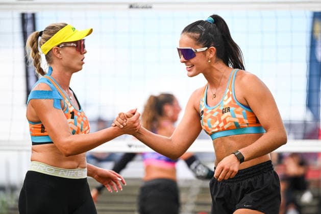 MONTREAL, QC - AUGUST 19: Chenoa Christ (GER) and Sophia Neuss (GER) react after scoring a point during a qualification match at Beach Pro Tour Montreal Elite 16 on August 19, 2026 at Parc Jean-Drapeau in Montreal, QC (Photo by David Kirouac Icon Sportswire) VOLLEYBALL: AUG 19 Beach Pro Tour Montreal Elite 16 EDITORIAL USE ONLY Icon26081906126