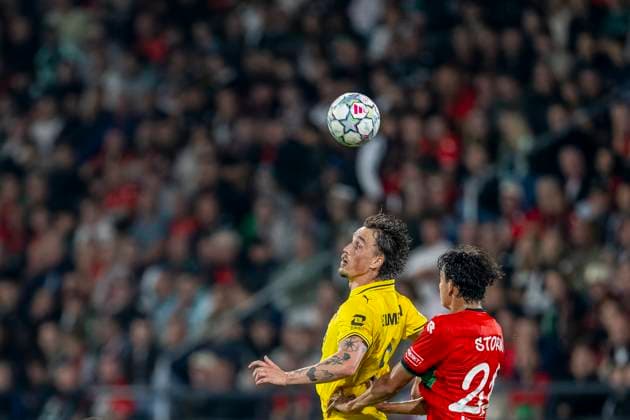 NIJMEGEN - FC Bodo Glimt aanvaller Andreas Helmersen en N.E.C. Nijmegen verdediger Tobias Storm tijdens de UEFA Champions League wedstrijd tussen N.E.C. en FC Bodo Glimt in Gofferpark op 19 augustus 2026 in Nijmegen, Nederland. - *** NIJMEGEN FC Bodo Glimt forward Andreas Helmersen and NEC Nijmegen defender Tobias Storm during the UEFA Champions League match between NEC and FC Bodo Glimt at Gofferpark on August 19, 2026, in Nijmegen, the Netherlands
