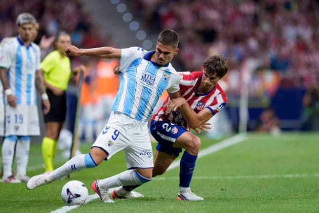 August 19, 2026, Madrid, Madrid, Spain: Chupe of Malaga CF and Robin Le Normand of Atletico de Madrid in action during the Spanish League, LaLiga EA Sports, football match played between Atletico de Madrid and Malaga CF at Riyadh Air Metropolitano stadium on August 19, 2026, in Madrid, Spain. Madrid Spain - ZUMAa181 20260819_zaa_a181_242 Copyright: xOscarxJ.xBarrosox