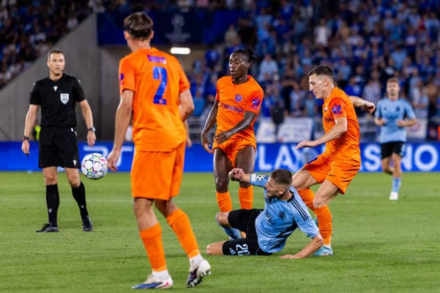 Mario Kvesic of Celje and Alen Mustafic of SK Slovan Bratislava seen during UEFA Champions league first play-off game between teams of SK Slovan Bratislava and Celje (Dominika Kortvelyesiova Ball Raw Images) Bratislava Tehelne Pole stadium Slovakia Copyright: xDominikaxKortvelyesiovax DKR_6145