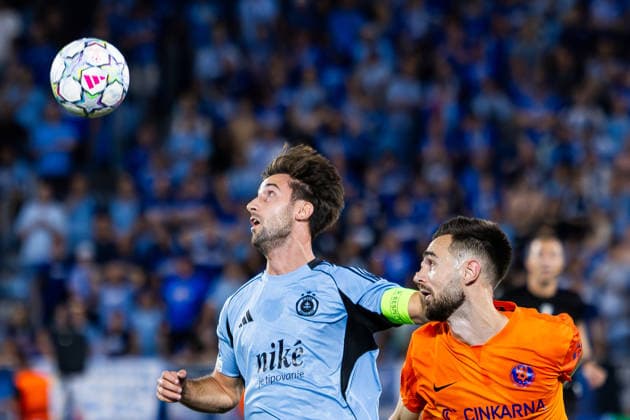 Andraz Sporar of SK Slovan Bratislava and Darko Hrka of Celje seen during UEFA Champions league first play-off game between teams of SK Slovan Bratislava and Celje (Dominika Kortvelyesiova Ball Raw Images) Bratislava Tehelne Pole stadium Slovakia Copyright: xDominikaxKortvelyesiovax DKR_6261