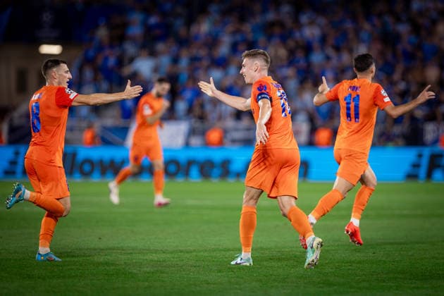 SLOVAN BRATISLAVA - CELJE Milot Avdyli of Celje celebrates a goal with Mario Kvesic, Mark Zabukovnik during the first leg of play off round of UEFA Champions league football match between SK SLovan Bratislava and Celje at the Tehelne Pole Narodny futbalovy stadion. Bratislava, Slovakia, August 19, 2026. Copyright: xx 080A9143
