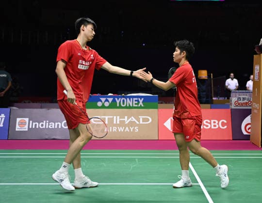 (260820) -- NEW DELHI, Aug. 20, 2026 -- China s Feng Yanzhe (L) Huang Dongping react during the mixed doubles round of 16 match between China s Feng Yanzhe Huang Dongping and Japan s Watanabe Yuta Taguchi Maya at BWF World Championships in New Delhi, Aug. 20, 2026. ) (SP)INDIA-NEW DELHI-BADMINTON-BWF WORLD CHAMPIONSHIPS-MIXED DOUBLES JavedxDar 