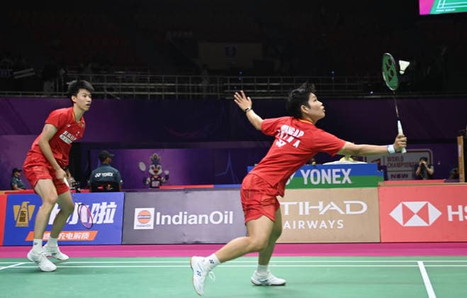 (260820) -- NEW DELHI, Aug. 20, 2026 -- China s Feng Yanzhe Huang Dongping (R) compete during the mixed doubles round of 16 match between China s Feng Yanzhe Huang Dongping and Japan s Watanabe Yuta Taguchi Maya at BWF World Championships in New Delhi, Aug. 20, 2026. ) (SP)INDIA-NEW DELHI-BADMINTON-BWF WORLD CHAMPIONSHIPS-MIXED DOUBLES JavedxDar 