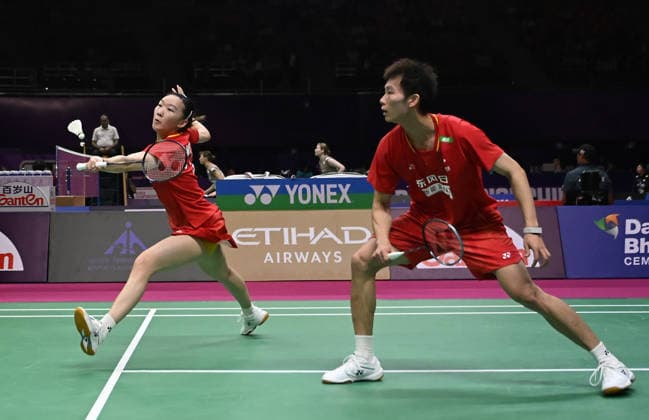 (260820) -- NEW DELHI, Aug. 20, 2026 -- Jiang Zhenbang Wei Yaxin (L) of China compete during the mixed doubles round of 16 match between Jiang Zhenbang Wei Yaxin of China and Pakkapon Teeraratsakul Sapsiree Taerattanachai of Thailand at BWF World Championships in New Delhi, India, Aug. 20, 2026. ) (SP)INDIA-NEW DELHI-BADMINTON-BWF WORLD CHAMPIONSHIPS-MIXED DOUBLES JavedxDar 