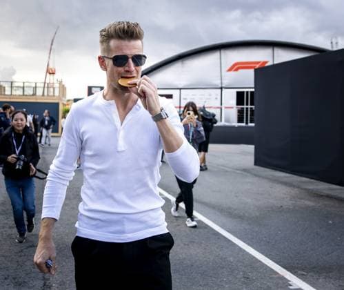ZANDVOORT - Nico Hulkenberg (Audi) eats a stroopwafel at the Zandvoort Circuit ahead of the Dutch F1 Grand Prix. SEM VAN DER WAL ANP xVIxANPxSportx xxANPxIVx 565862629 originalFilename: 565862629.jpg