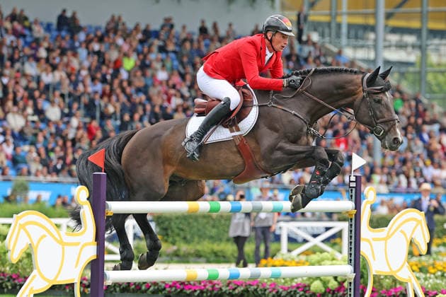 Daniel Deusser (GER, Deutschland) mit Pferd Otello de Guldenboom , Team Deutschland mit drei weiteren 0 Runden in der Führung , Springen, FEI Jumping World Championship, WM, Weltmeisterschaft , FEI Jumping World Championship Second Competition Team Final & Second Individual Qualifier, Mercedes-Benz Prize, Mercedes-Benz Prize, Einzel und Teamwertung, Jumping , AACHEN - FEI World Championships 2026, Weltfest des Pferdesports, Reitsport Weltmeisterschaft 2026, Aachen 2026, Welcome Home 2026, Aachener Soers, 11. bis 23. August 2026, Reitsport, 20.08.2026, Aachen Aachener Soers Deutschland *** Daniel Deusser (GER, Germany) riding Otello de Guldenboom; Team Germany remains in the lead with three additional clear rounds; Show Jumping, FEI Jumping World Championship; FEI Jumping World Championship Second Competition, Team Final, Second Individual Qualifier, Mercedes-Benz Prize, Mercedes-Benz Prize, Individual and Team Standings, Jumping, AACHEN FEI World Championships 2026, World Festival of Equestrian Sports, 2026 Equestrian World Championships, Aachen 2026, Welcome Home 2026, Aachen Soers, August 11–23, 2026, Equestrian Sports, August 20, 2026, Aachen Soers, Germany
