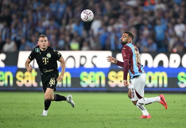 Trabzonspor v Ferencvaros - UEFA Europa League TRABZON, TURKIYE - AUGUST 20: Mohamed Salah (R) of Trabzonspor in action against Philippe Rommens (L) Ferencvaros during the first leg of the UEFA Europa League play-off round between Trabzonspor and Ferencvaros at Papara Park in Trabzon, Turkiye, on August 20, 2026. Hakan Burak Altunoz Anadolu Trabzon Turkey. Editorial use only. Please get in touch for any other usage.  Copyright: x2026xAnadoluxHakanxBurakxAltunozx