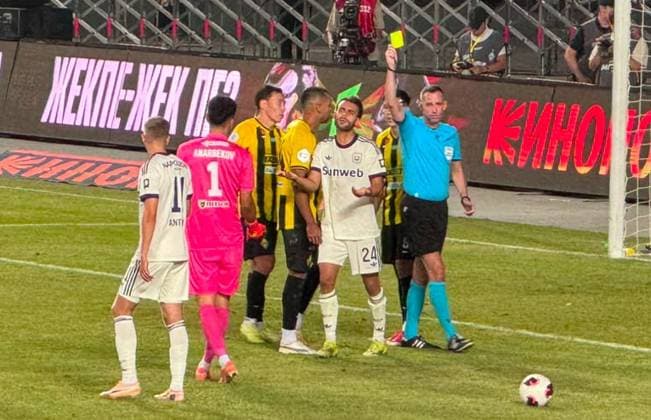Anderlecht s Enric Llansana receives a yellow card from the referee during a game between Kazach Kairat and Belgian RSC Anderlecht, in Almaty, Kazachstan, on Thursday 20 August 2026, a game in the knockout round of the UEFA Europa League competition. YELAMANxTURYSSBEKOV  x183845065x