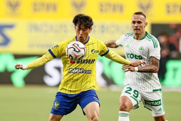 STVV s Kaito Matsuzawa and Omonoia s Jure Balkovec fight for the ball during a soccer game between Belgian Sint-Truidense V.V. and Cypriot AC Omonoia Nicosia, Thursday 20 August 2026 in Sint-Truiden, the first leg of the play-off round for the UEFA Europa League league phase. BRUNOxFAHY  x183846650x