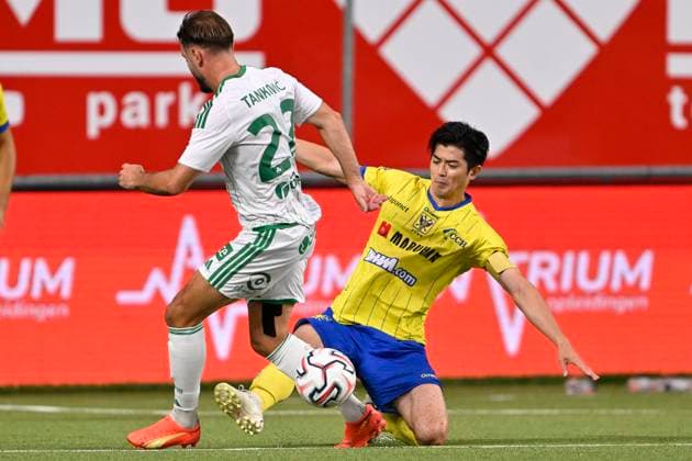 Sint-Truidense VV v Omonia Nicosia AC - UEFA Europa League SINT-TRUIDEN, BELGIUM - AUGUST 20 : Taniguchi Shogo defender of Sint-Truidense VV and Tankovic Muamer forward of Omonia Nicosia AC during the UEFA Europa League 2026 27 play-off round first leg between Sint-Truidense VV and Omonia Nicosia AC on August 20, 2026 in Sint-Truiden, Belgium, 20 08 2026 Sint-Truiden Belgium  Copyright: xDhax