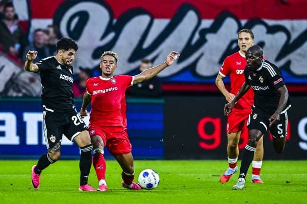ENSCHEDE , 20 08-2026 , Stadium Grolsch Veste , season 2026 2027 , UEFA Conference League play-off football , match between FC Twente and FK Qarabag , picture shows Qarabag player Kady , Twente player Daouda Weidmann Twente - Qarabag  x205876311x Copyright: