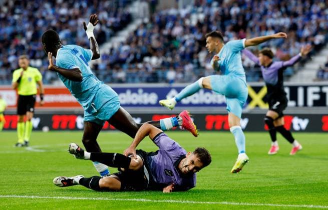 Warren O Hora of Hibernian is fouled by El Bachir Ngom of KAA Gent for a penalty. Gent v Hibernian, UEFA Conference League, Play-Off Round, First Leg, Football, Planet Group Arena, Gent, Belgium - 20 Aug 2026Gent Planet Group Arena Belgium  Copyright: xMauricexvanxSteen Shutterstockx 17108685p