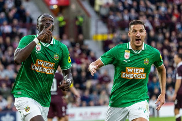 SOCCER - UEFA ECL, Hearts vs Rapid EDINBURGH,SCOTLAND,20.AUG.26 - SOCCER - UEFA Conference League, play-off, Heart of Midlothian FC vs SK Rapid Wien. Image shows the rejoicing of Serge-Philippe Raux-Yao and Ercan Kara (Rapid).  GEPAxpictures xPhilippxBrem
