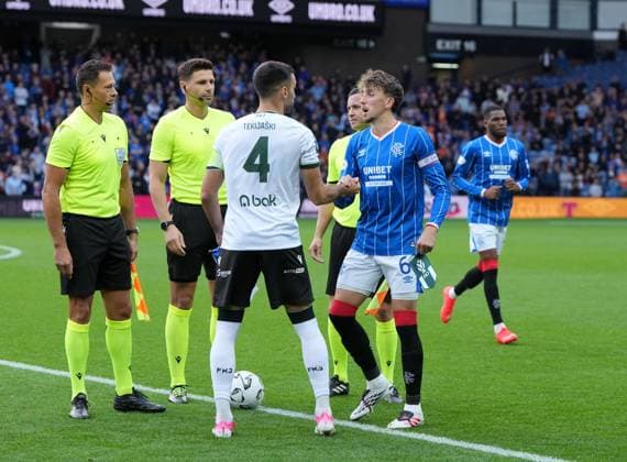 FK Jablonec captain Nemanja Tekijaski & Rangers captain Dan Neil shake hands before kick off. Rangers v Jablonec, UEFA Conference League, Play-Off Round, First Leg, Football, Ibrox Stadium, Glasgow, Scotland, UK - 20 Aug 2026Glasgow Ibrox Stadium Scotland United Kingdom  Copyright: xStuartxWallace Shutterstockx 17108686q