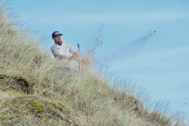 BALMEDIE, SCOTLAND - AUG 20: Joel Girrbach (CHE) plays from the sand dunes above the 10th green during Round 1 at the 2026 Nexo Championship at the Trump International Golf Links, Balmedie on August 20, 2026 in Aberdeenshire, Scotland The 2026 Nexo Championship