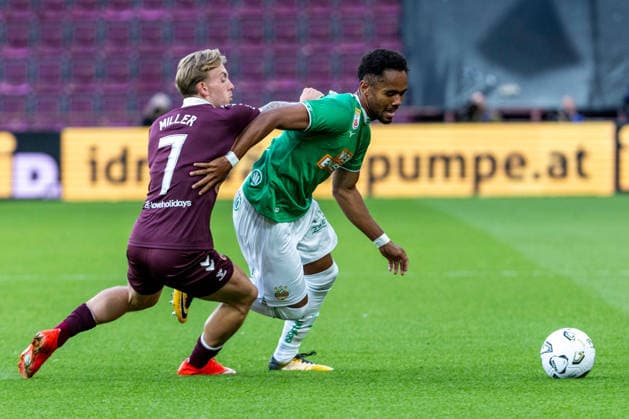 SOCCER - UEFA ECL, Hearts vs Rapid EDINBURGH,SCOTLAND,20.AUG.26 - SOCCER - UEFA Conference League, play-off, Heart of Midlothian FC vs SK Rapid Wien. Image shows Calvin Miller (Hearts) and Petter Nosa Dahl (Rapid).  GEPAxpictures xPhilippxBrem