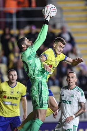 Omonoia s goalkeeper Fabiano and STVV s Samed Bazdar fight for the ball during a soccer game between Belgian Sint-Truidense V.V. and Cypriot AC Omonoia Nicosia, Thursday 20 August 2026 in Sint-Truiden, the first leg of the play-off round for the UEFA Europa League league phase. BRUNOxFAHY  x183852163x