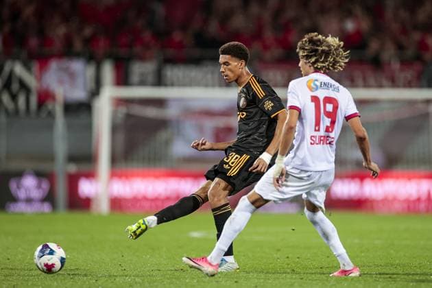 SION , 2008-2026, Stade de Tourbillon , season 2026 2027 , UEFA Conference League play-off football . Match between FC Sion and Ajax, Picture shows Ajax player Aaron Bouwman and FC Sion player Franck Surdez Sion - Ajax  x205877461x Copyright: