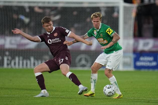 Tonni Adamsen of SK Rapid and Stuart Findlay of Heart of Midlothian Heart of Midlothian v Rapid Vienna, UEFA Conference League, Play-Off Round, First Leg, Football, Tynecastle Park, Edinburgh, Scotland, UK - 20 Aug 2026Edinburgh Tynecastle Park United Kingdom  Copyright: xPetexSummers Shutterstockx 17108692eh