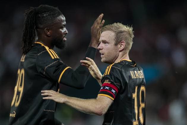 SION , 2008-2026, Stade de Tourbillon , season 2026 2027 , UEFA Conference League play-off football . Match between FC Sion and Ajax, Picture shows Ajax player Davy Klaassen scores the 2-4 and celebrate his goal with Ajax player Toluwalase Arokodare Sion - Ajax  x205877928x Copyright: