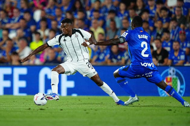 Getafe CF v FK Partizan - UEFA Conference League 2026 27 Play-offs 1st Leg Samson Vitalis Nwulu of FK Partizan is seen in action under pressure from Dakonam Djene of Getafe CF during the UEFA Conference League 2026 27 play-offs first leg match between Getafe CF and FK Partizan at Estadio Coliseum on August 20, 2026 in Getafe, Spain. Getafe Estadio Coliseum Madrid Spain Copyright: xGokhanxTanerx xPSxImagesxGokhanxTanerx