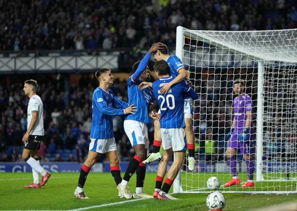 Ryan Naderi of Rangers lifts Daisuke Yokota of Rangers (assist) as he celebrates with team mates after scoring to give Rangers a 1-0 lead. Rangers v Jablonec, UEFA Conference League, Play-Off Round, First Leg, Football, Ibrox Stadium, Glasgow, Scotland, UK - 20 Aug 2026Glasgow Ibrox Stadium Scotland United Kingdom  Copyright: xStuartxWallace Shutterstockx 17108686aw