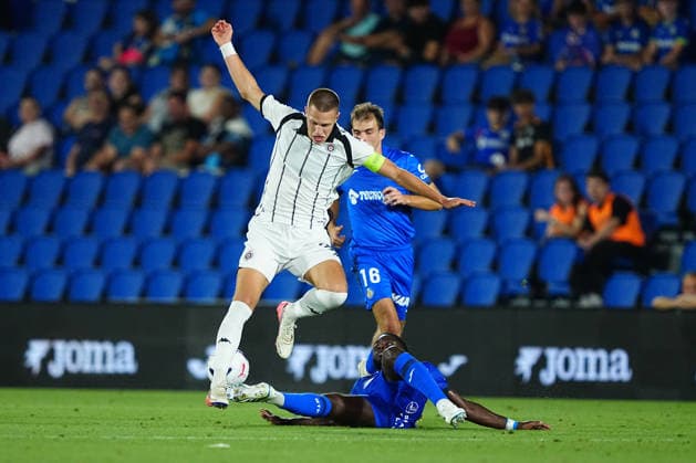 Getafe CF v FK Partizan - UEFA Conference League 2026 27 Play-offs 1st Leg Orel Mangala of Getafe CF challanges for the ball with Ognjen Ugresic of FK Partizan during the UEFA Conference League 2026 27 play-offs first leg match between Getafe CF and FK Partizan at Estadio Coliseum on August 20, 2026 in Getafe, Spain. Getafe Estadio Coliseum Madrid Spain Copyright: xGokhanxTanerx xPSxImagesxGokhanxTanerx