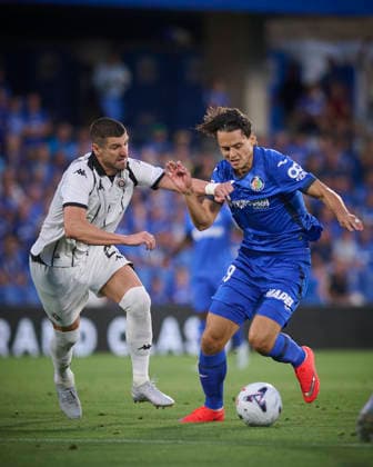 Getafe CF™s Enes Unal (r) and FK Partizan™s Stefan Mitrovic during Conference League 2026 2027 Play-offs, 1st leg match. August 20,2026. (20260820018)