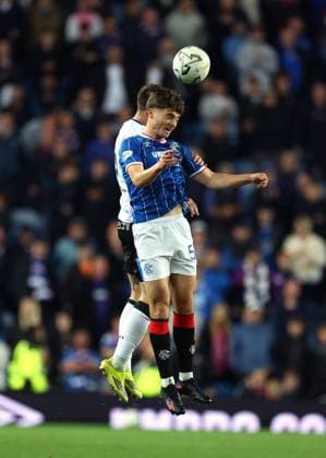 Findlay Curtis of Rangers jumps for the ball during the UEFA Conference League play-off round first leg at Ibrox Stadium, Glasgow. Rangers v Jablonec - UEFA Conference League - Play-Off Round First Leg - Ibrox Stadium, Glasgow, Lanarkshire, Scotland, UK - 20 Aug 2026Glasgow Ibrox Lanarkshire United Kingdom  Copyright: xO Rourke RangersxFC Shutterstockx 17110133ar