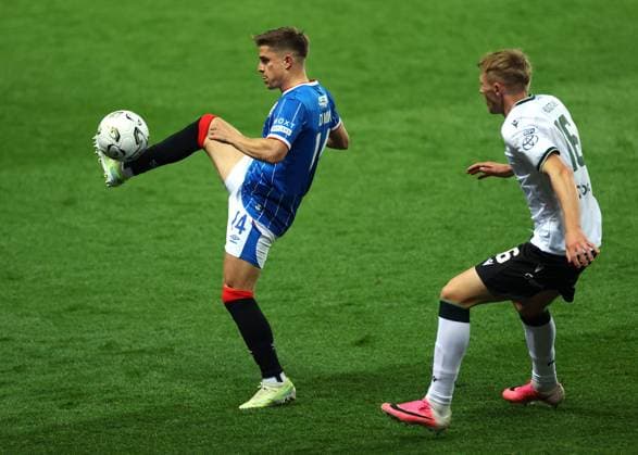 Cameron Devlin of Rangers and Hugo Ahl of Jablonec during the UEFA Conference League play-off round first leg at Ibrox Stadium, Glasgow. Rangers v Jablonec - UEFA Conference League - Play-Off Round First Leg - Ibrox Stadium, Glasgow, Lanarkshire, Scotland, UK - 20 Aug 2026Glasgow Ibrox Lanarkshire United Kingdom  Copyright: xO Rourke RangersxFC Shutterstockx 17110133as