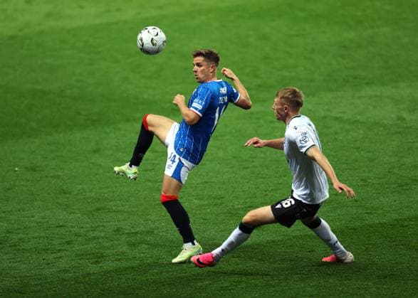 Cameron Devlin of Rangers and Hugo Ahl of Jablonec during the UEFA Conference League play-off round first leg at Ibrox Stadium, Glasgow. Rangers v Jablonec - UEFA Conference League - Play-Off Round First Leg - Ibrox Stadium, Glasgow, Lanarkshire, Scotland, UK - 20 Aug 2026Glasgow Ibrox Lanarkshire United Kingdom  Copyright: xO Rourke RangersxFC Shutterstockx 17110133au