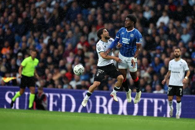 Richard Sedlacek of Jablonec jumps with Tochi Chukwuani of Rangers during the UEFA Conference League play-off round first leg at Ibrox Stadium, Glasgow. Rangers v Jablonec - UEFA Conference League - Play-Off Round First Leg - Ibrox Stadium, Glasgow, Lanarkshire, Scotland, UK - 20 Aug 2026Glasgow Ibrox Lanarkshire United Kingdom  Copyright: xO Rourke RangersxFC Shutterstockx 17110133bz