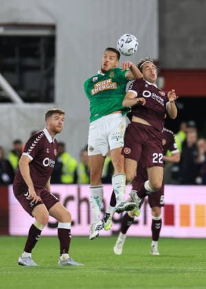 Heart of Midlothian v SK Rapid Wien UEFA Europa Conference League Ercan Kara of SK Rapid Wien wins a header against T—mas Bent Magnœsson of Heart of Midlothian during the UEFA Europa Conference League Play-Off First Leg match at Tynecastle Park, Edinburgh 20 08 2026 UK Newspapers OUT Copyright: xFredxPalmerx FIL-23809-0193