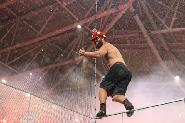 Atalanta v Hapoel Tev Aviv FC - UEFA Conference League - Gewiss Stadium Bergamo, Italy, 20th August 2026. A Hapoel Tel-Aviv FC fan goads Atalatna BC fans during the Atalanta vs Hapoel Tev Aviv FC UEFA Conference League Play off 1st Leg match at Stadio di Bergamo, Bergamo. Picture credit should read: Jonathan Moscrop Bergamo Stadio di Bergamo