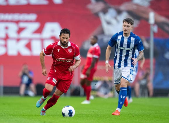 Patrik Walemark of KKS Lech Poznan pressing during UEFA Europa League - Playoff Round season 26 27 match between teams of KKS Lech Poznan and FC Thun (Ruslan Taran Ball Raw Images) Poznan Enea Stadium Poland Copyright: xRuslanxTaranx _IMG2745
