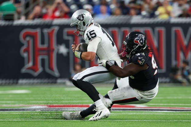 HOUSTON, TX - AUGUST 20: Quarterback Fernando Mendoza 15 of the Las Vegas Raiders is sacked by defensive tackle Kayden McDonald 93 of the Houston Texans during the NFL, American Football Herren, USA preseason game between the Houston Texans and the Las Vegas Raiders on August 20, 2026, at Reliant Stadium in Houston, TX. (Photo by David Buono Icon Sportswire) NFL: AUG 20 Raiders at Texans EDITORIAL USE ONLY Icon260820019