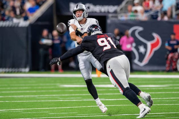 August 20, 2026: Las Vegas Raiders quarterback Fernando Mendoza (15) throws the ball away while taking a hit from Houston Texans defensive tackle Naquan Jones (91) during a preseason game between the Las Vegas Raiders and the Houston Texans in Houston, TX. .. CSM USA - ZUMAc04_ 20260820_faf_c04_008 Copyright: xTraskxSmithx