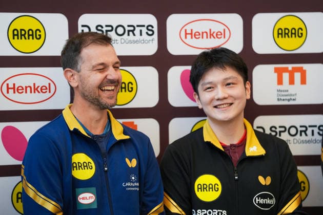 DUSSELDORF, GERMANY - AUGUST 20: German Table tennis, Tischtennis star Timo Boll (first left), Chinese table tennis star Fan Zhendong (second left) attend a press conference, PK, Pressekonferenz after a welcoming ceremony held by his new club Borussia Dusseldorf on August 20, 2026 in Dusseldorf, Germany. Chinese table tennis star Fan Zhendong was officially unveiled by his new club Borussia Dusseldorf at a press conference on Thursday, as the Olympic champion prepares for his second season in the German Table Tennis Bundesliga and another campaign in European competition.  Copyright: xVCGx 111661096502