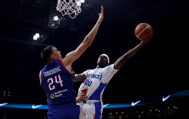 (260821) -- BELGRADE, Aug. 21, 2026 -- France s Sylvian Francisco (R) vies with Serbia s Nikola Tanaskovic (L) during a friendly basketball match between Serbia and France in Belgrade, Serbia on August 20, 2026. (Photo by Xinhua) (SP)SERBIA-BELGRADE-BASKETBALL-FRIENDLY-SERBIA-FRANCE DjordjexKostic 