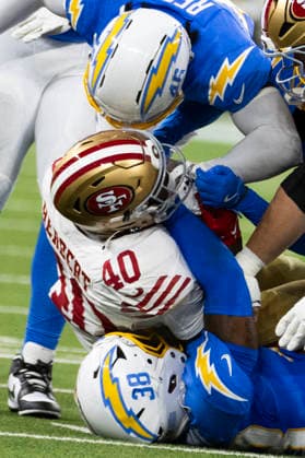 August 20, 2026, Inglewood, California, USA: San Francisco 49ers Running Back Khalil Herbert (40) is brought down by Los Angeles Chargers Safety Devin Grant (38) and Cornerback Nikko Reed (46) during an NFL, American Football Herren, USA football preseason game, in Inglewood, Calif. on Thursday August 20, 2026. Inglewood USA - ZUMAc68_ 20260820_zaf_c68_029 Copyright: xRingoxChiux