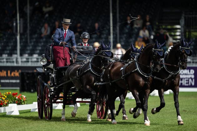 260821 Fredrik Persson of Sweden with horses Fasco, Hertog Jan, Judson and Kermit compete in the Four-in-Hand Dressage during day 11 of the 2026 FEI World Championships on August 21, 2026 in Aachen. Photo: Emma Wallskog BILDBYRAN kod EW EW0695 ridsport equestrian rid-vm 2026 2026 fei world championships bbeng ridsport-vm fyrspann drivning körning dressyr dressage four in hand *** August 21, 2026: Fredrik Persson of Sweden, riding the horses Fasco, Hertog Jan, Judson, and Kermit, competes in the Four-in-Hand Dressage on Day 11 of the 2026 FEI World Championships on August 21, 2026 in Aachen. Photo by Emma Wallskog. BILDBYRAN code EW EW0695 equestrian sports 2026 World Championships 2026 FEI World Championships bbeng equestrian sports World Championships four-in-hand driving dressage four-in-hand  Copyright: EMMAxWALLSKOG BB260821EW010