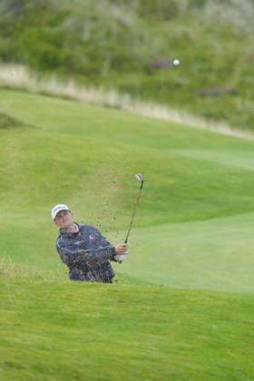 BALMEDIE, SCOTLAND - AUG 21: Connor McKinney (AUS) plays from a bunker on the 7th hole during Round 2 at the 2026 Nexo Championship at the Trump International Golf Links, Balmedie on August 21, 2026 in Aberdeenshire, Scotland The 2026 Nexo Championship
