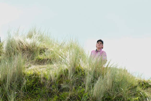 BALMEDIE, SCOTLAND - AUG 21: John Daly II (USA) checks his line from high in the dunes on the 7th hole during Round 2 at the 2026 Nexo Championship at the Trump International Golf Links, Balmedie on August 21, 2026 in Aberdeenshire, Scotland The 2026 Nexo Championship