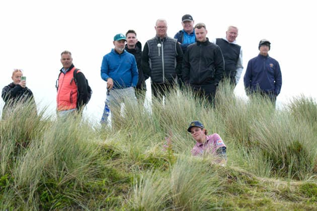 BALMEDIE, SCOTLAND - AUG 21: John Daly II (USA) chips to the 8th green from the dunes during Round 2 at the 2026 Nexo Championship at the Trump International Golf Links, Balmedie on August 21, 2026 in Aberdeenshire, Scotland The 2026 Nexo Championship