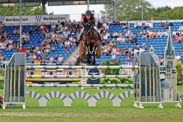 Brianne Beerbaum (GER) auf Pferd Kiss me, 11. Platz, Tochter von Meredith Michaels-Beerbaum und Markus Beerbaum, Internationaler Wettbewerb für Junge Reiter im Rahmen der WM, Aachener Dom Hindernis, Stawag-Preis, STAWAG-Prize, Jumping Competition (Penalties Time) for Young Riders , AACHEN - FEI World Championships 2026, Weltfest des Pferdesports, Reitsport Weltmeisterschaft 2026, Aachen 2026, Welcome Home 2026, Aachener Soers, 11. bis 23. August 2026, Reitsport, 21.08.2026, Aachen Aachener Soers Deutschland *** Brianne Beerbaum (GER) riding Kiss Me, 11th place, daughter of Meredith Michaels Beerbaum and Markus Beerbaum, International Competition for Young Riders as part of the World Championships, Aachen Cathedral Jumping Competition, STAWAG Prize, Jumping Competition: Penalties and Time for Young Riders, AACHEN FEI World Championships 2026, World Equestrian Festival, 2026 World Equestrian Games, Aachen 2026, Welcome Home 2026, Aachen Soers, August 11–23, 2026, Equestrian Sports, August 21, 2026, Aachen Soers, Germany