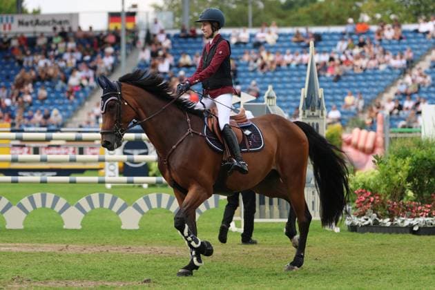 Brianne Beerbaum (GER) auf Pferd Kiss me, 11. Platz, Tochter von Meredith Michaels-Beerbaum und Markus Beerbaum, Internationaler Wettbewerb für Junge Reiter im Rahmen der WM, Daumen hoch an die Deutschen Fans im Publikum, Emotion, Stawag-Preis, STAWAG-Prize, Jumping Competition (Penalties Time) for Young Riders , AACHEN - FEI World Championships 2026, Weltfest des Pferdesports, Reitsport Weltmeisterschaft 2026, Aachen 2026, Welcome Home 2026, Aachener Soers, 11. bis 23. August 2026, Reitsport, 21.08.2026, Aachen Aachener Soers Deutschland *** Brianne Beerbaum (GER) riding Kiss Me, 11th place, daughter of Meredith Michaels Beerbaum and Markus Beerbaum, International Competition for Young Riders as part of the World Championships, Thumbs up to the German fans in the audience, Emotion, Stawag Prize, STAWAG Prize, Jumping Competition (Penalties Time) for Young Riders, AACHEN FEI World Championships 2026, World Festival of Equestrian Sports, 2026 World Equestrian Games, Aachen 2026, Welcome Home 2026, Aachen Soers, August 11–23, 2026, Equestrian Sports, August 21, 2026, Aachen Soers, Germany